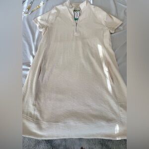 Cream tunics with pocket and zipper